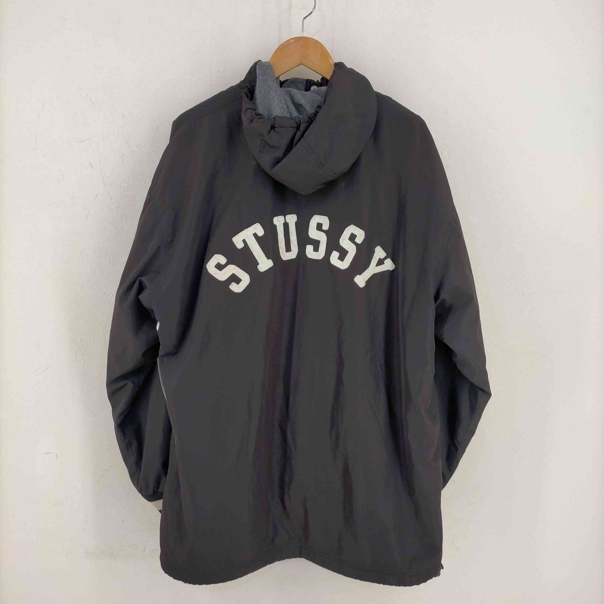 Stussy(ステューシー)紺タグ アーチロゴ nylon stadium coat